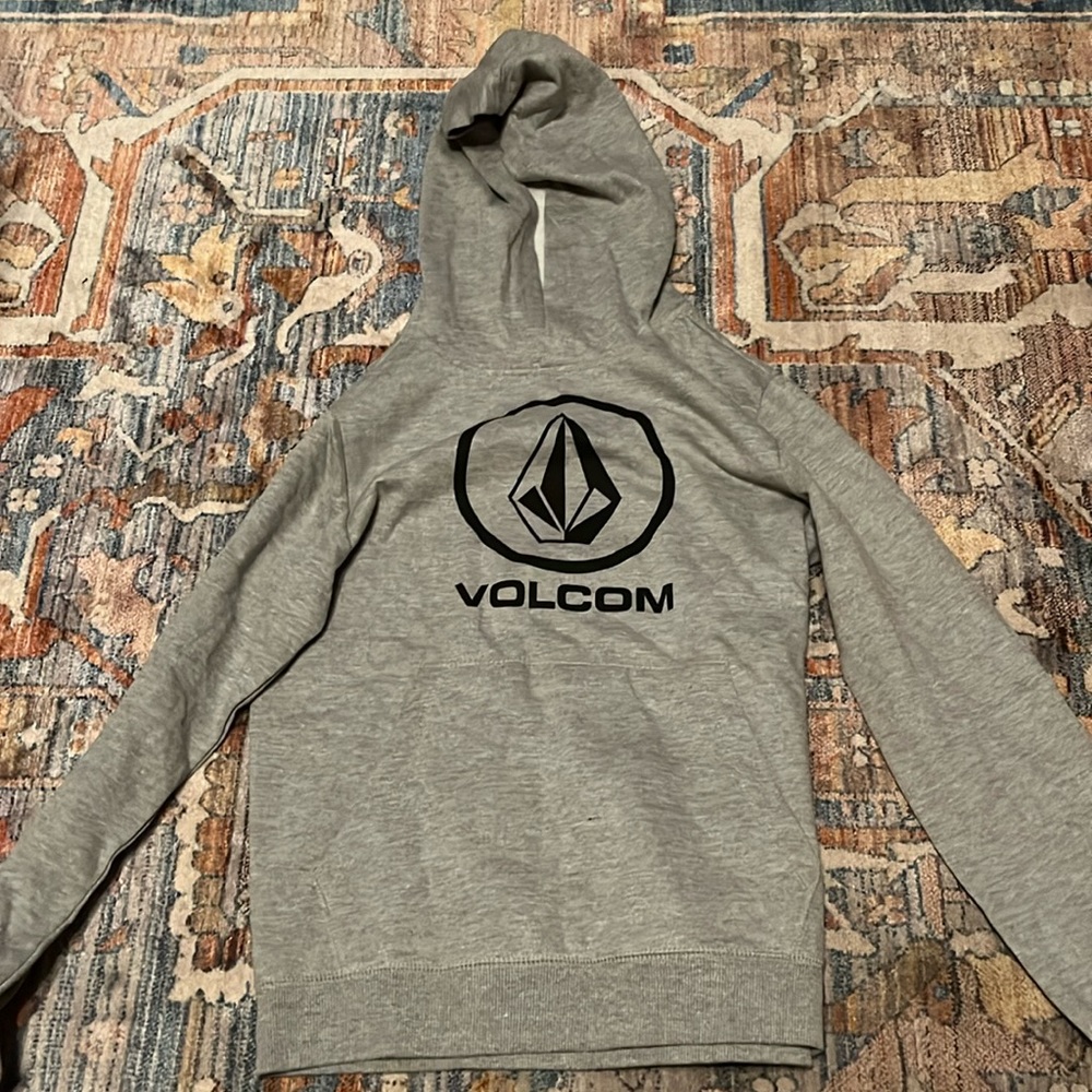 Gray hoodie soft material in the inside, tag still on it and never worn